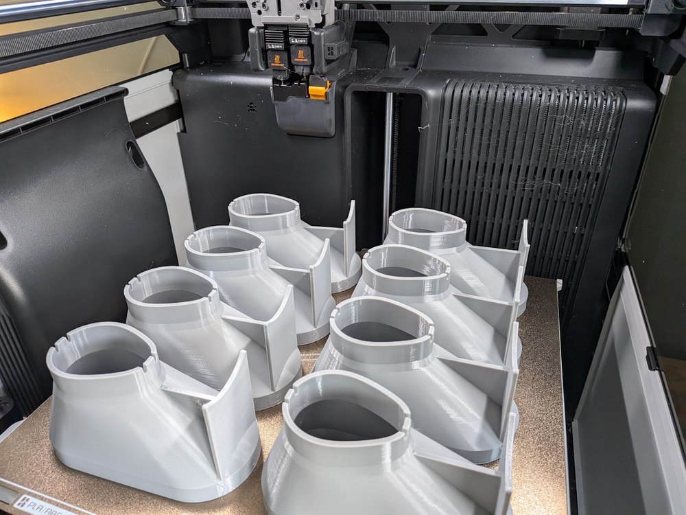 Spa Filter Adapter parts on Ryan Kunz's 3D printer bed
